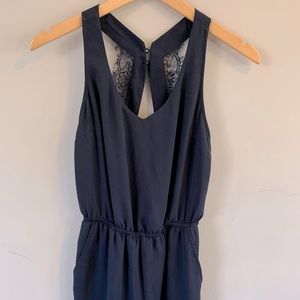 Navy blue romper with pockets! Size 2 from H&M. Would say it runs small for a 2.
